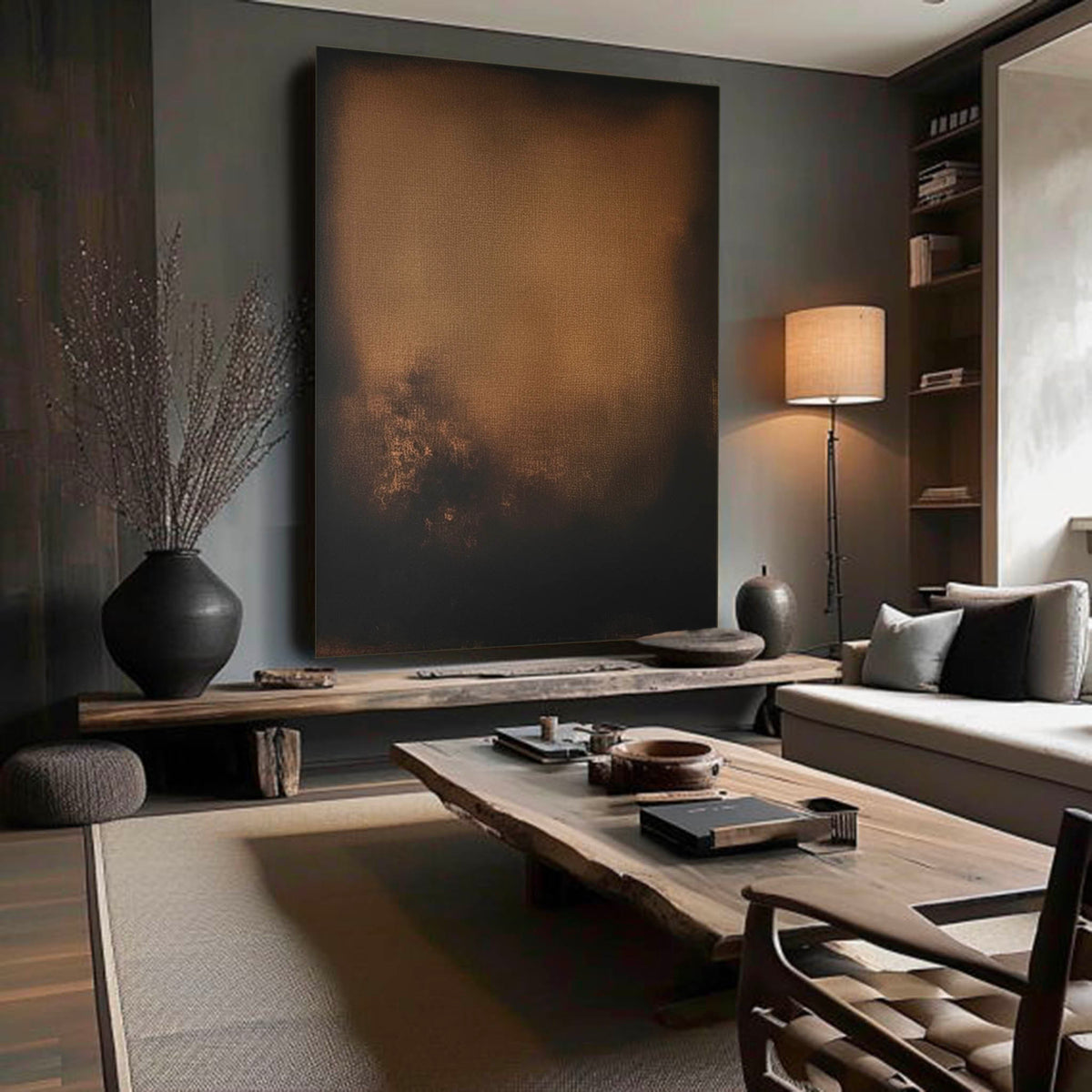 An amber glow fading into a black field above a wooden desk