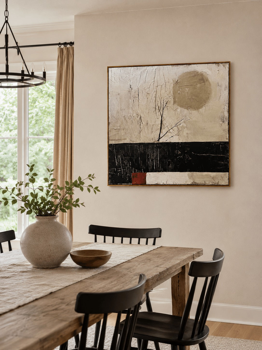 Bare Branches and a Pale Moon Abstract Wall Art, displayed behind a wooden dining table