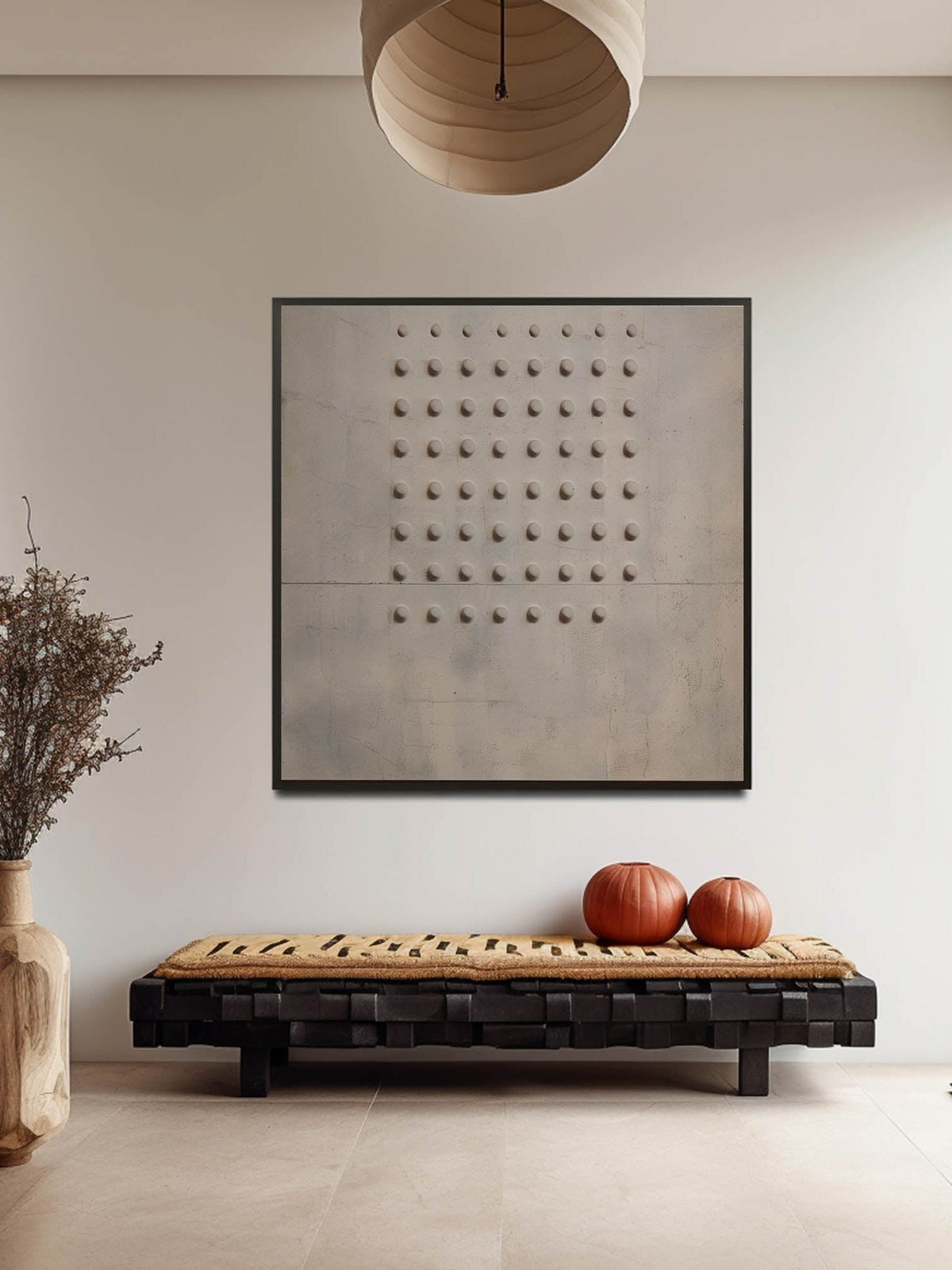 A compact grid of small dark relief dots on beige above a patterned bench