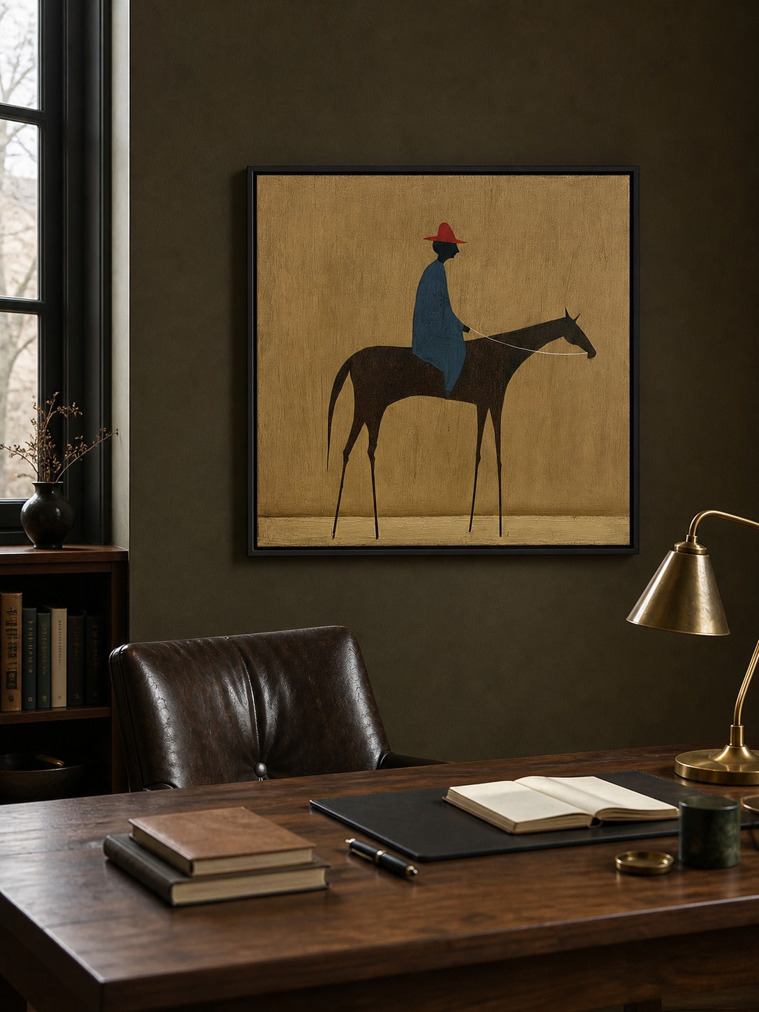 Horse and rider wall art above an office desk