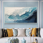 A crashing blue wave with broad white foam in a bright seating area