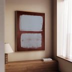 Two blue gray fields within a burgundy border above a wooden bench