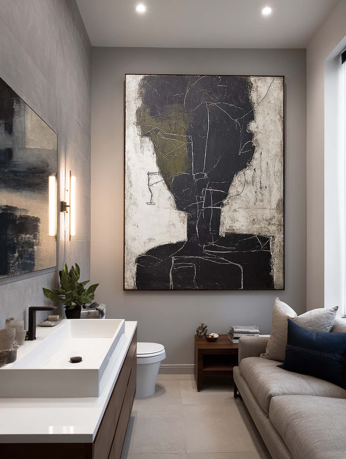 An abstract charcoal face outline with an olive accent above a sofa