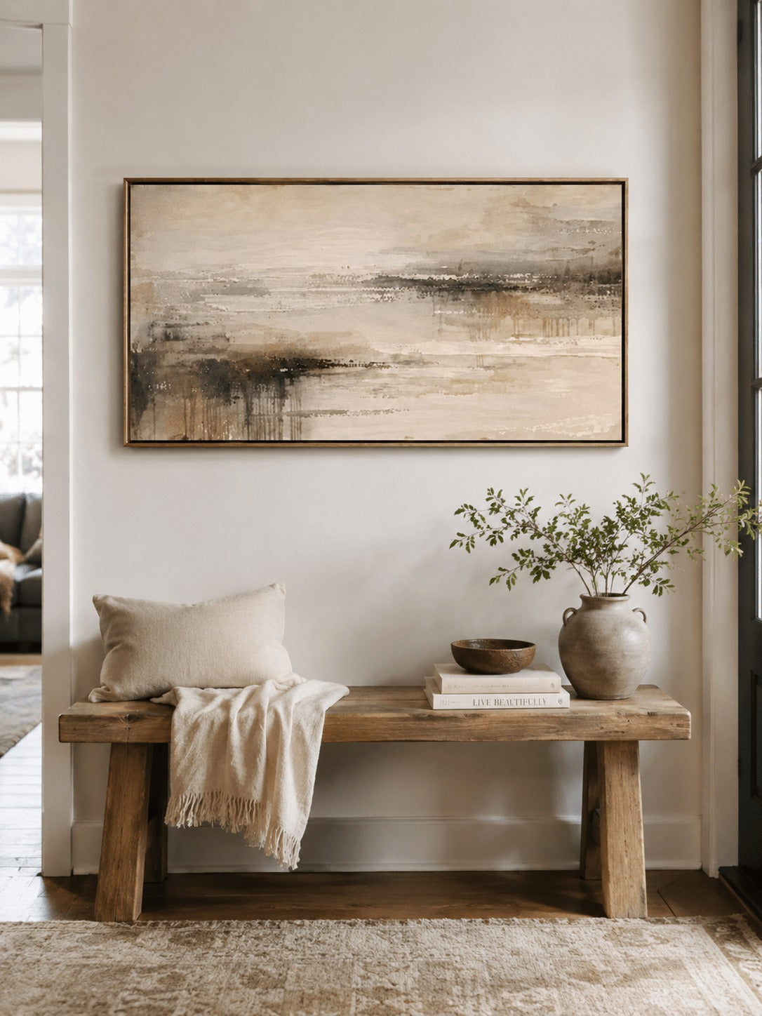 Beige and charcoal canvas above a wood bench