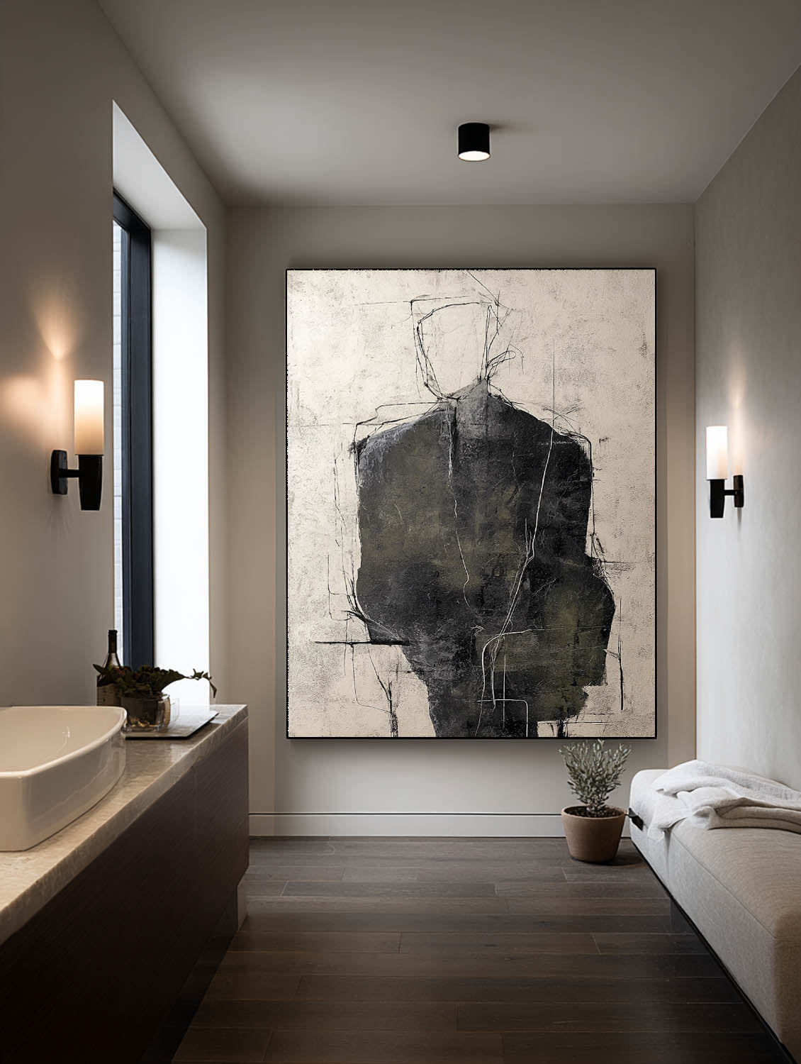 A charcoal figure with a fine outlined head on beige in a bathroom
