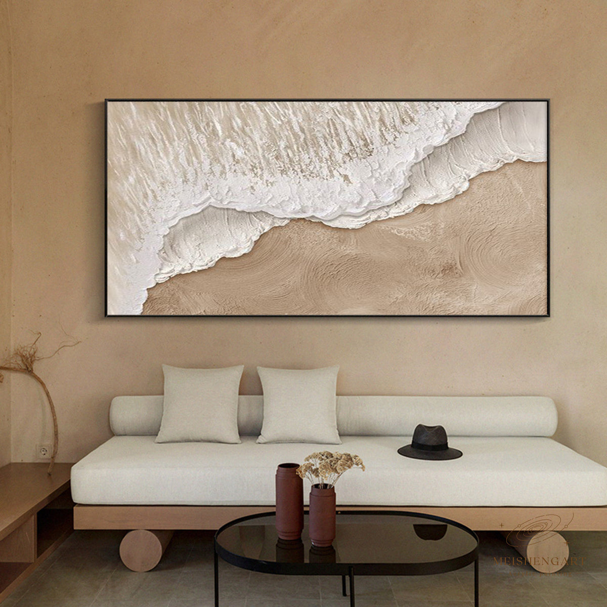 A broad white foamy shoreline over beige above a low sofa